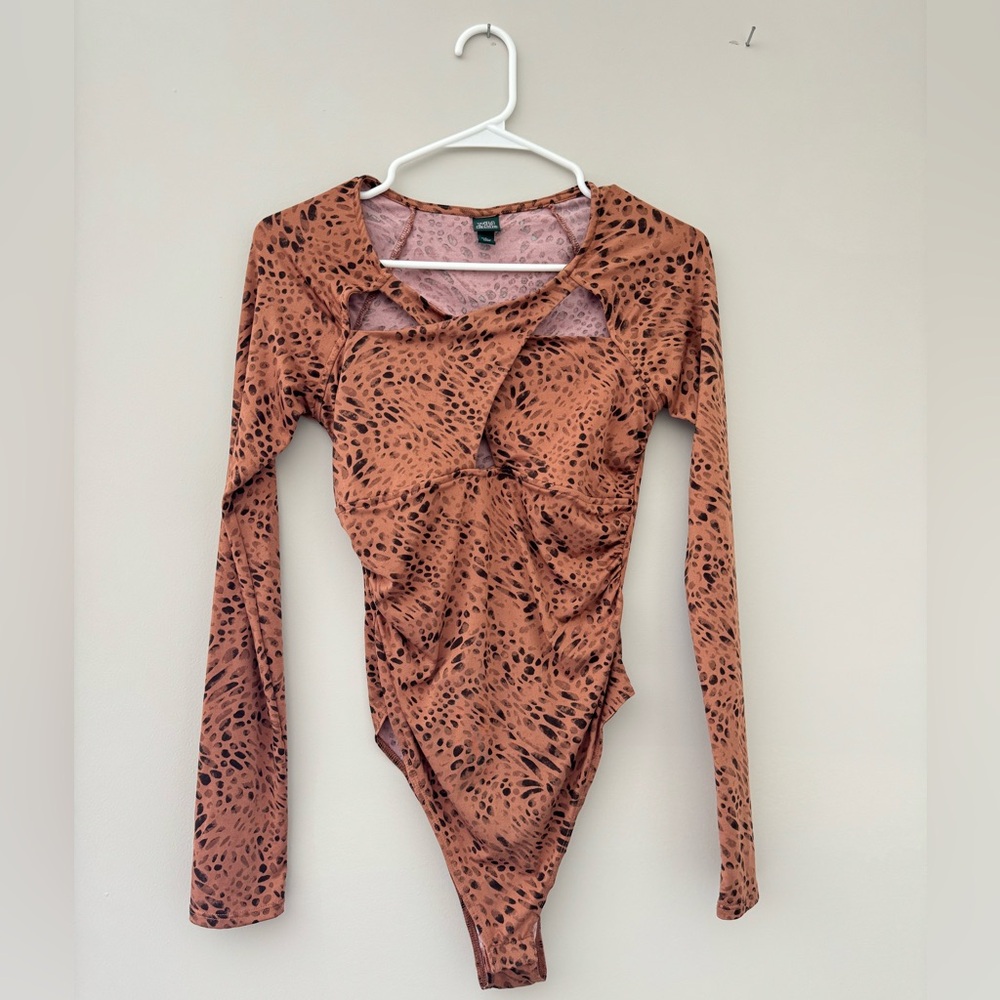 Cheetah Going Out Top